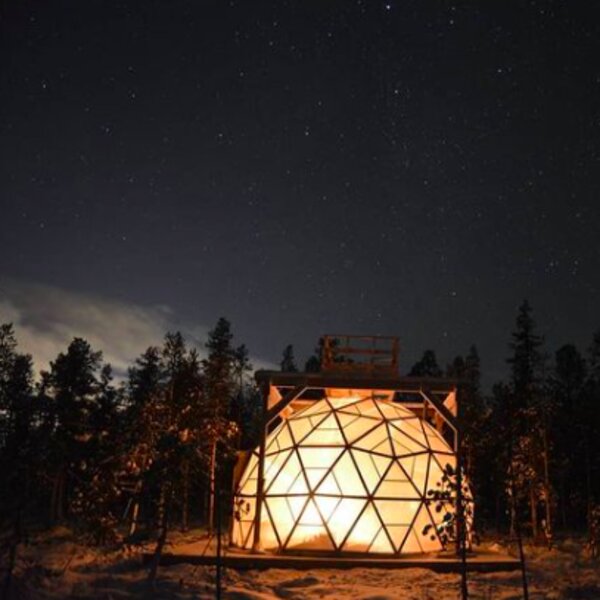 igloo under the northern lights in lapland