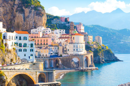 Morning view of Amalfi cityscape on coast line of mediterranean sea, Italy