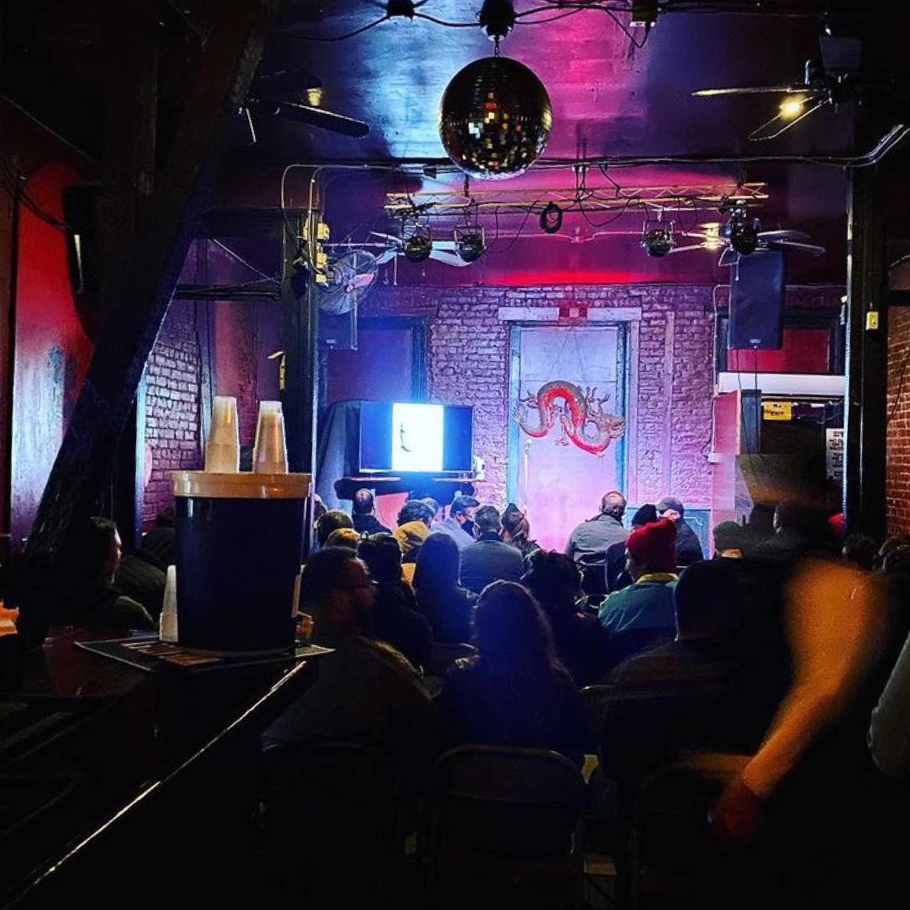 Crowded room at the Dragon's Den in New Orleans