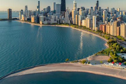 Chicago downtown skyline with park and the beach.
